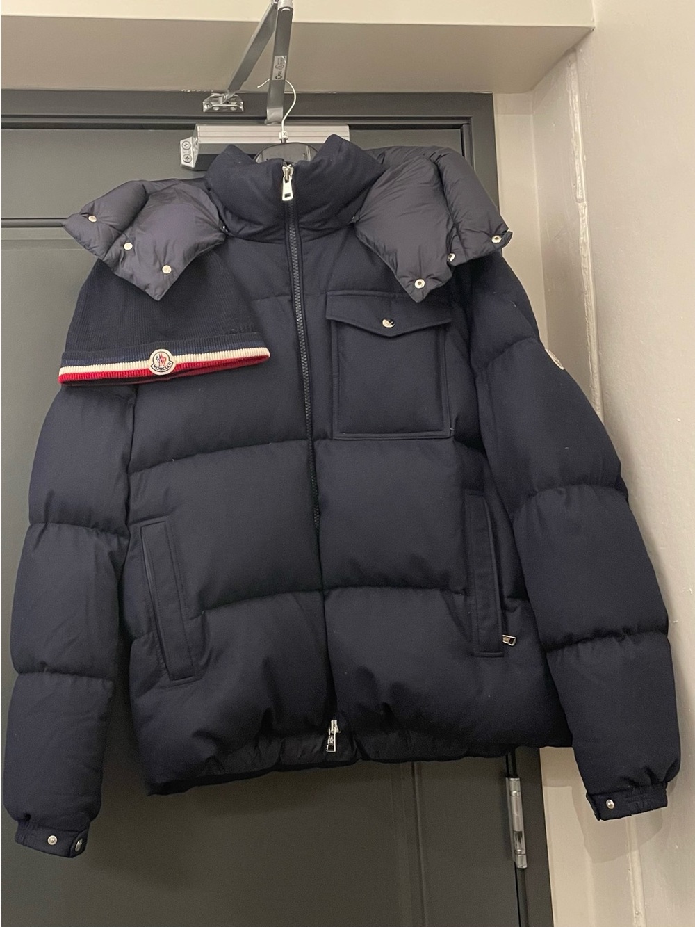 Moncler Black Jacket with Red & Blue Ribbon Trim with matching Moncler hat